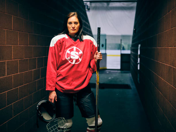 istock Woman Hockey Player 1250304704