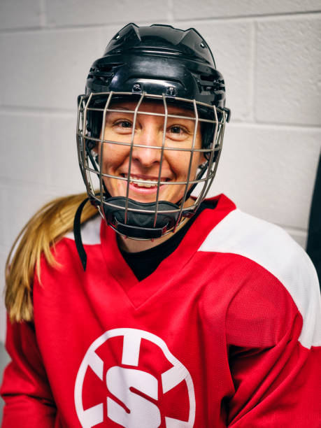 istock Women's Hockey Team in a Locker Room 1250304750
