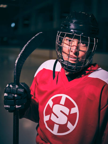 istock Woman Hockey Player on the Ice 1250304812