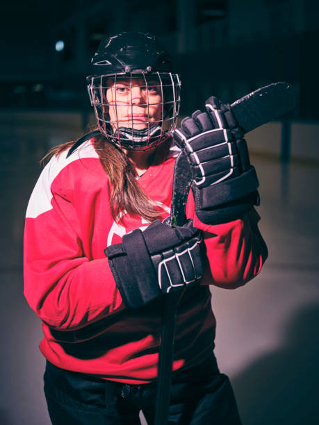 istock Woman Hockey Player on the Ice 1250304874