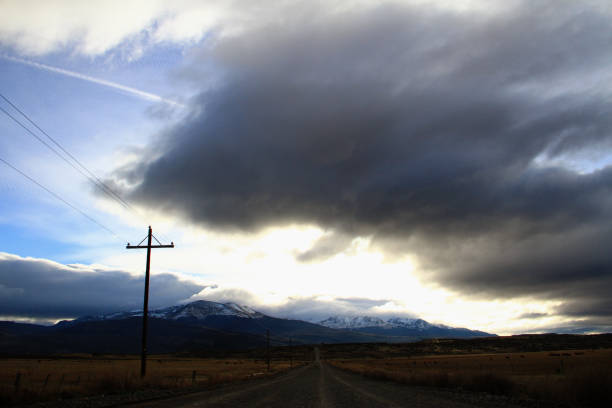 istock Clouds over the road in Patagonian Andes 1250305041
