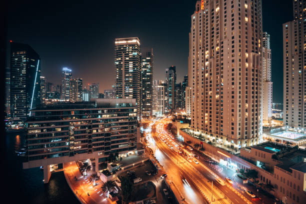 dubai marina w nocy - night cityscape dubai long exposure zdjęcia i obrazy z banku zdjęć