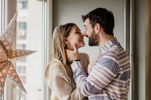 istock Loving young couple at home 1250310847