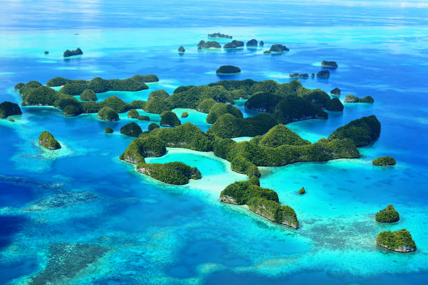 Seventy Islands in Palau The Seventy Islands are part of the Rock Islands of Palau, found between the larger islands of Koror and Peleliu. palau stock pictures, royalty-free photos & images