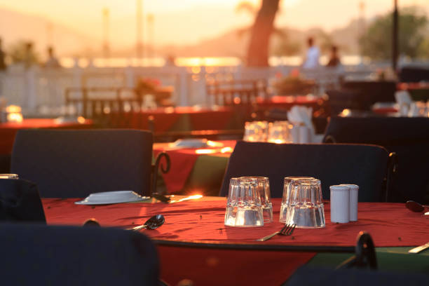 istock Tables set for meal on terrace during the sunset 1250313966