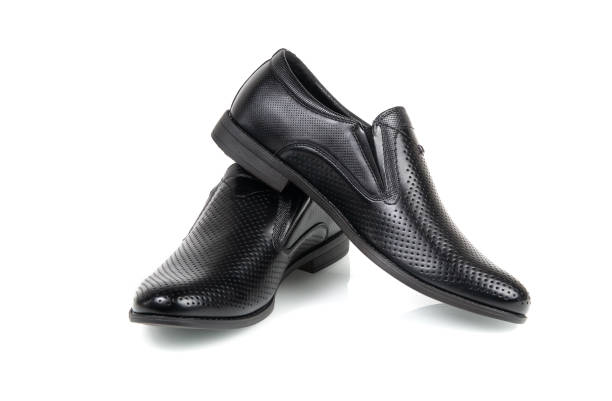 istock black mens shoes isolated on a white background 1250314317