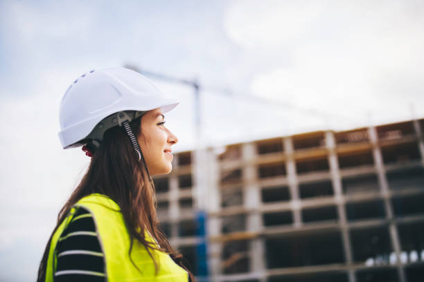 Portrait Of Woman Architect On Construction Site.