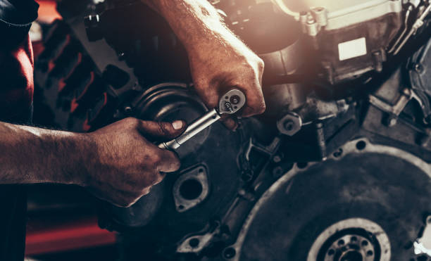 Engine repair and service Engine repair and service auto mechanic photos stock pictures, royalty-free photos & images