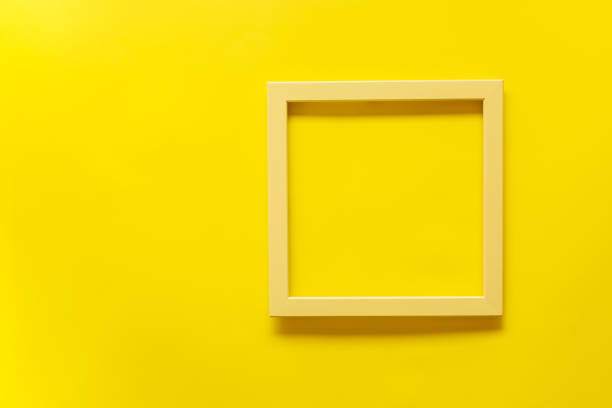 istock Yellow vintage frame on yellow background. Top view, blank space 1250322634