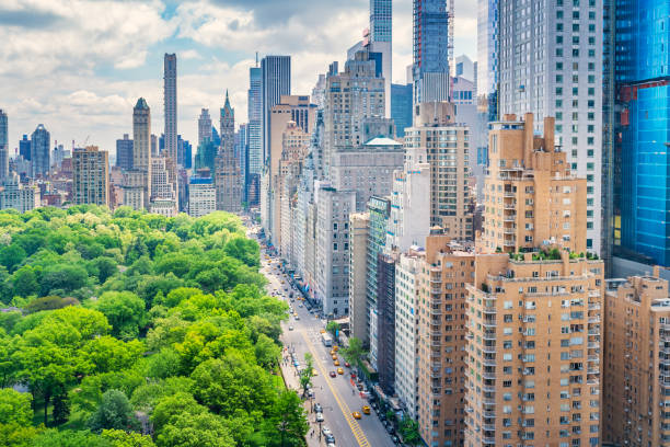 Central Park and 59th Street Manhattan New York City USA Central Park and 59th Street in Manhattan, New York City, USA as seen from above on a sunny day central park manhattan stock pictures, royalty-free photos & images