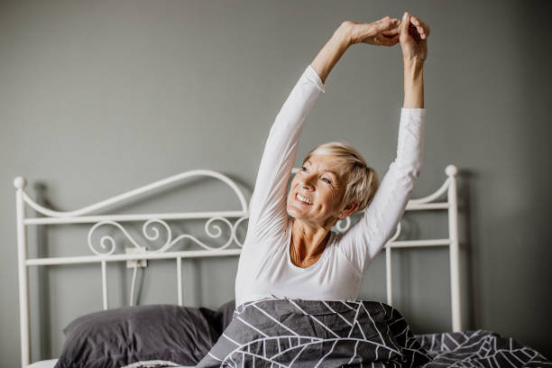 istock Senior woman is waking up 1250327057