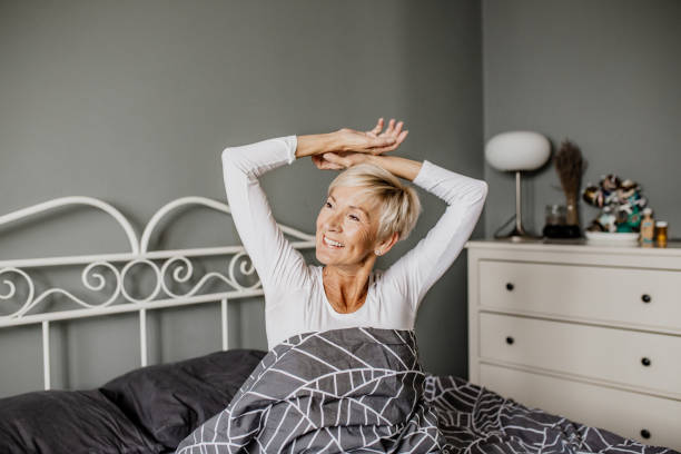 istock Senior woman is waking up 1250327062
