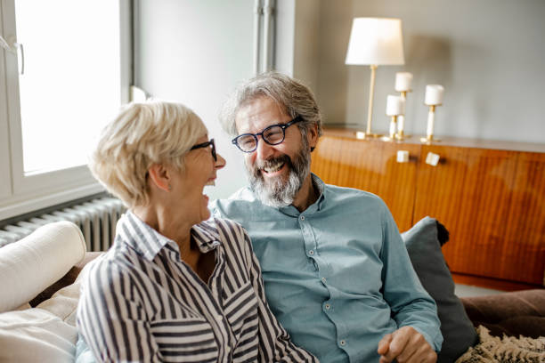 istock Loving senior couple at home 1250327066