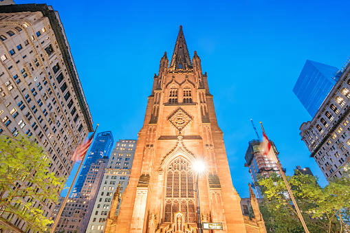 The landmark Trinity Church in Lower Manhattan New York City USA at twilight blue hour