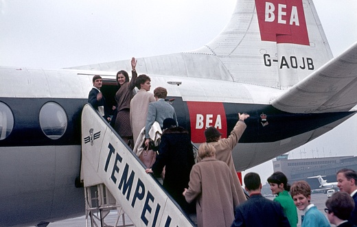 Berlin (West), Germany, 1968. Travelers board a BEA passenger plane at Tempelhof Airport.