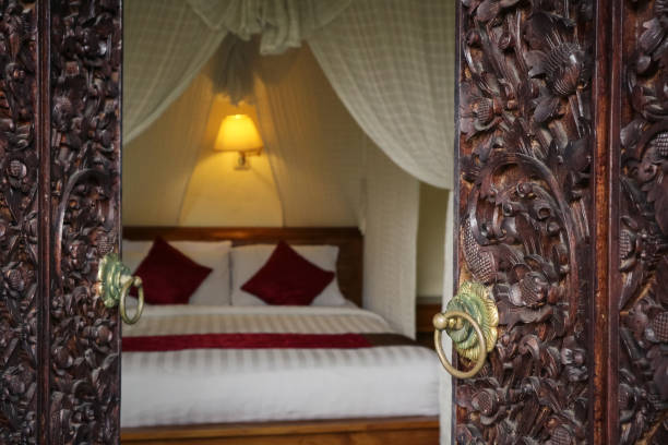 istock Traditional balinese bed with canopy 1250335123