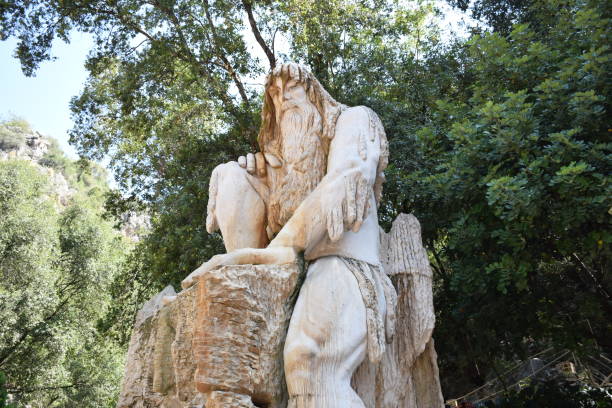Large Kronos Statue at Jeita Grotto stock photo