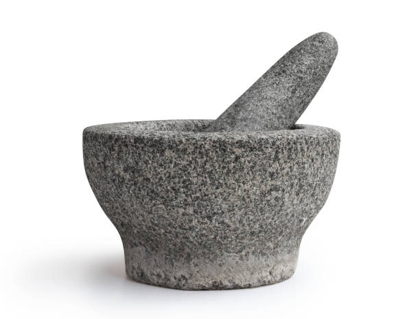 istock Stone mortar and pestle isolated on white background 1250343555