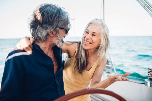 istock Senior couple sailing the sea and having fun 1250348416