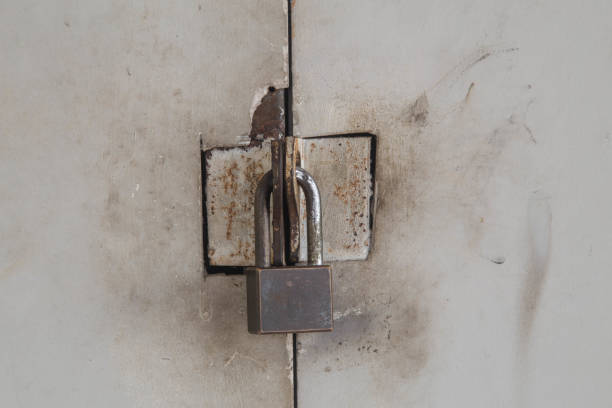 istock The door is closed with an old metal lock 1250350190