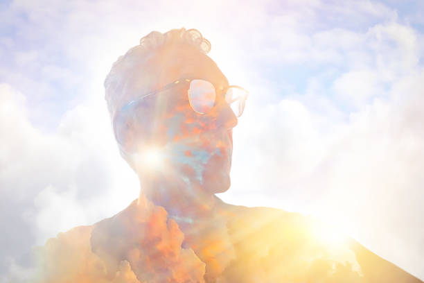 istock Multiple exposure of senior man and cloudscape 1250350572