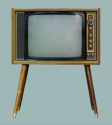 TV vintage en armario de madera. TV retro en armario de madera. photo