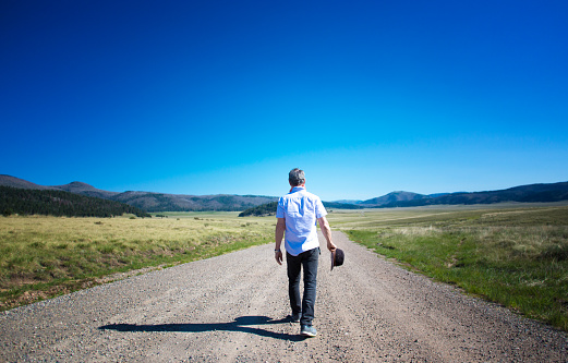 Man Walking Alone in Valles Caldera Wilderness, New Mexico