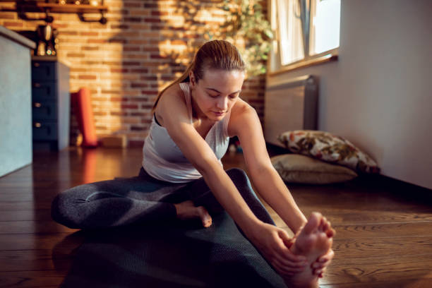 istock Woman doing the Janu Sirsasana Pose 1250355336