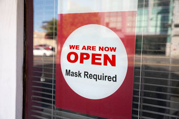 istock Store reopening sign. Mask Required. 1250367173