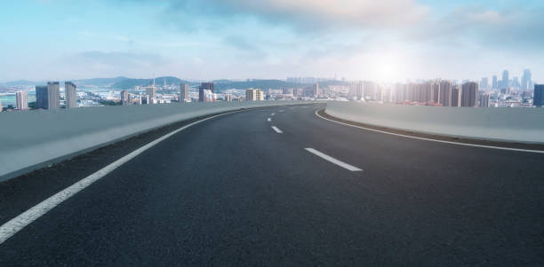 istock Road surface and urban landscape 1250371236