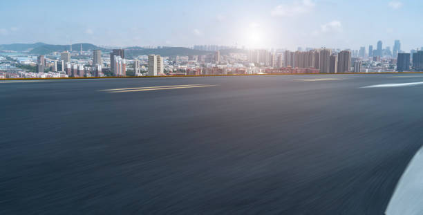 istock Road surface and urban landscape 1250371417