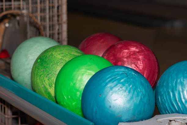 istock Very old colorful bowling balls background 1250378873