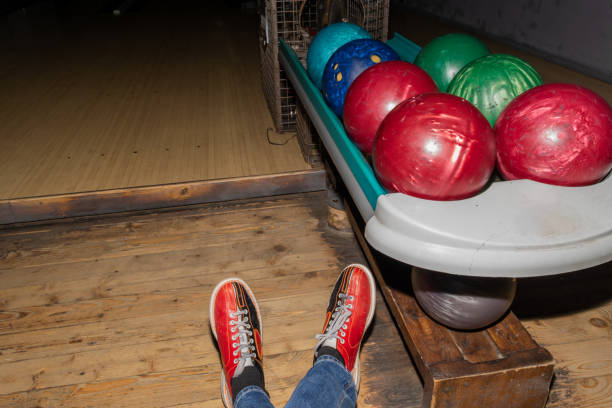 istock Very old colorful bowling balls background 1250378874