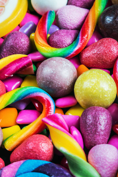 istock background from variety of sweets, lollipops, chewing gum 1250390932