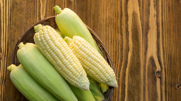 istock Pure white corn on a wooden table. 1250402894