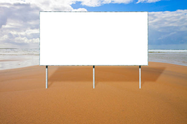 istock Blank advertising billboard in a natural beach landscape - concept image with copy space 1250404154