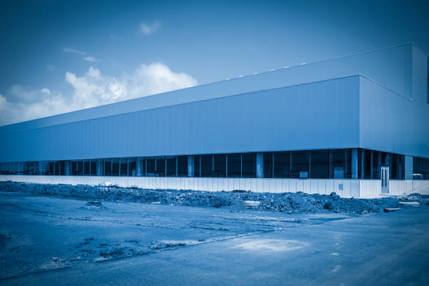 istock Modern factory building and asphalt floor 1250404157