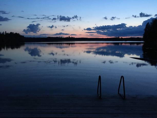 istock Finland lake nature beautiful sunset 1250404486