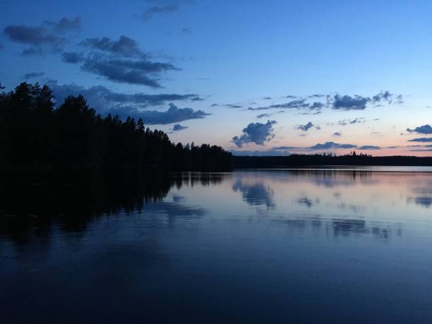 istock Finland lake nature beautiful sunset 1250404564