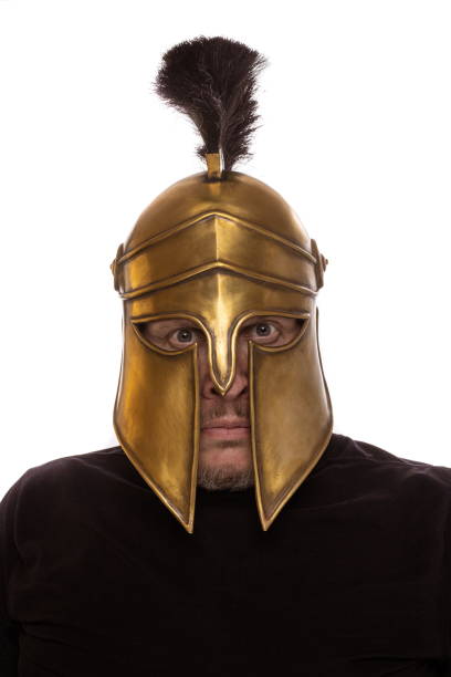 istock Man in historical copy helmet Spartan warrior on a white background 1250405497