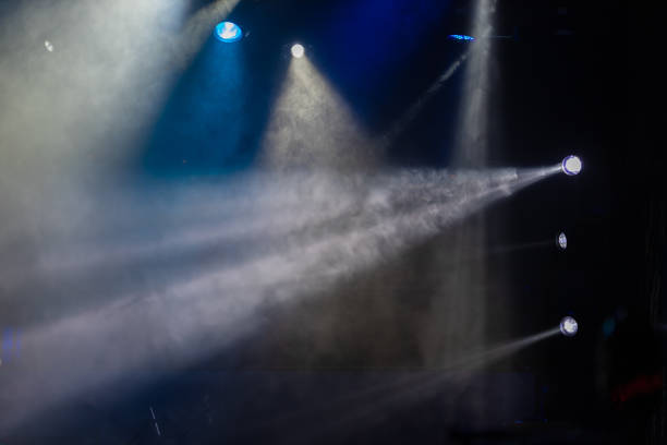 istock lights spotlights and smoke over the stage 1250405833