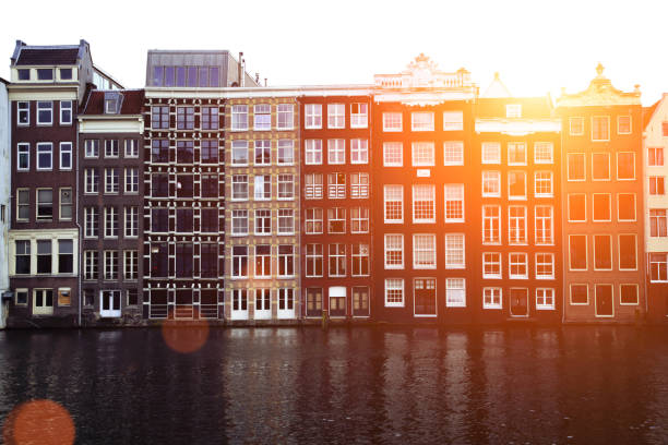Netherlands Amsterdam Damrak canal house facade architecture
