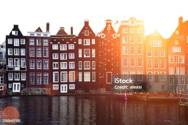 Netherlands Amsterdam Damrak Canal House Facade Architecture Stock Photo - Download Image Now