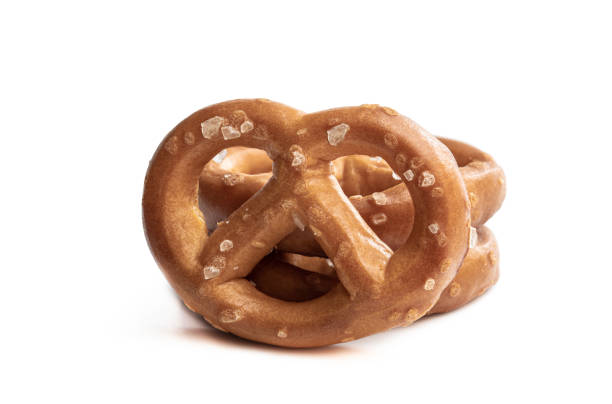 istock Salted pretzels isolated on white background 1250410356