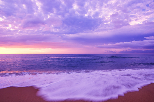 Sunset beach with dramatic sky