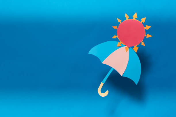 istock Illustrative umbrella, sun and blue background 1250416308