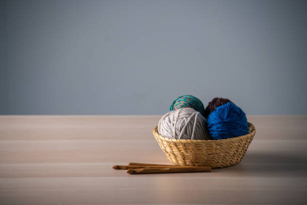 istock Yarn balls and crochet needles. 1250417799
