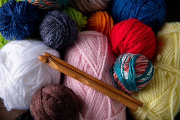 istock Yarn balls and crochet needles. 1250418169