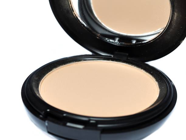 istock Cosmetic foundation cream and powder with mirror isolated on white background 1250425072