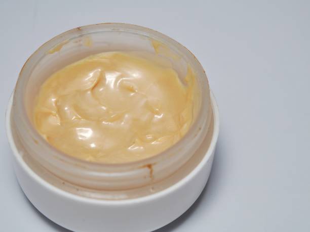 istock Cosmetic foundation cream and powder isolated on white background 1250425152